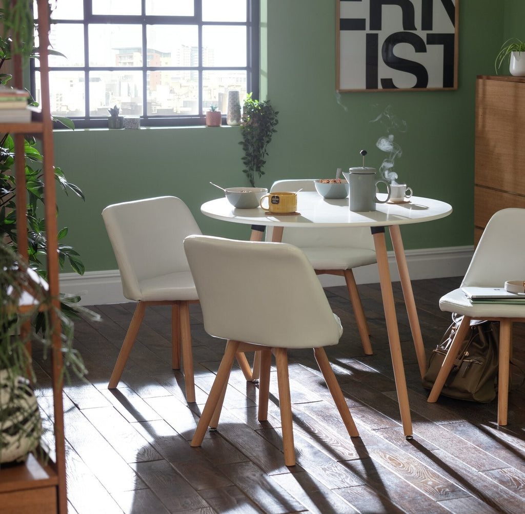 Habitat Quattro Modern Round Dining Table and 4 Chairs in White Faux Leather